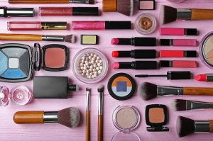 1 Various cosmetics on pink background