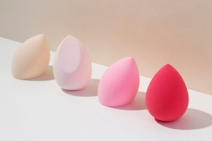 Colorful makeup sponges in a row