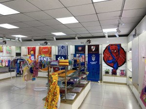 Interior of a store displaying various colorful goods