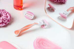 Pink shaving tools and beauty items