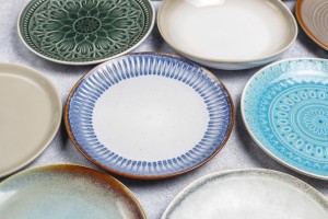 Different ceramic empty plates and bowls.