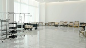 interior of a bright spacious room with various furniture and storage racks