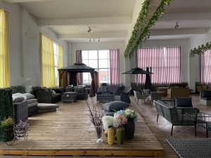 interior of a stylish furniture showroom with various seating arrangements and decor